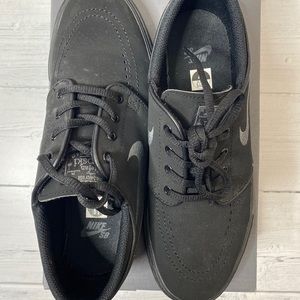 All Black Nike SBs
